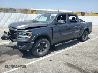 2021 Ram 1500 Rebel with VIN 1C6SRFLT4MN760746, listed as a Copart auction lot 56405175 with 100,493 mi miles and Salvage title. Bid and sale history available at DreamBid. Image 1.