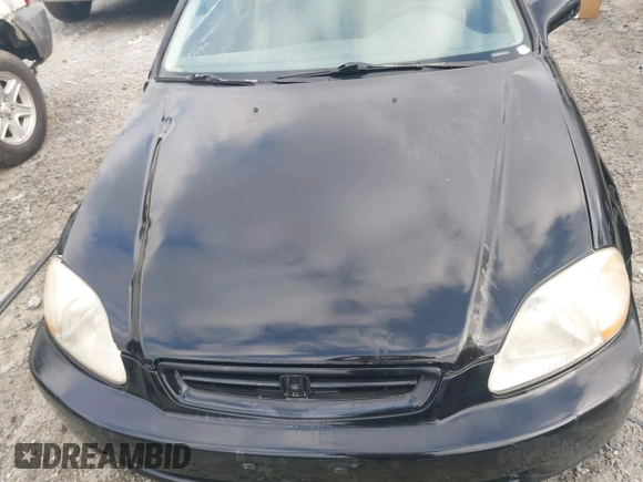 1997 Honda Civic DX with VIN 1HGEJ6125VL095006, listed as a IAAI auction lot 41473812 with 264,966 mi miles. Bid and sale history available at carsss.com. Image 10.