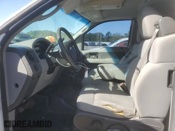 2007 Ford F-150 STX with VIN 1FTRX12W37NA05703, listed as a Copart auction lot 51927885 with 206,593 mi miles and Salvage Title. Bid and sale history available at DreamBid. Image 7.