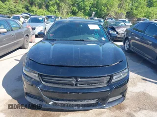2016 Dodge Charger SXT with VIN 2C3CDXHG8GH354631, listed as a IAAI auction lot 42036201 with 196,344 mi miles and . Bid and sale history available at carsss.com. Image 6.