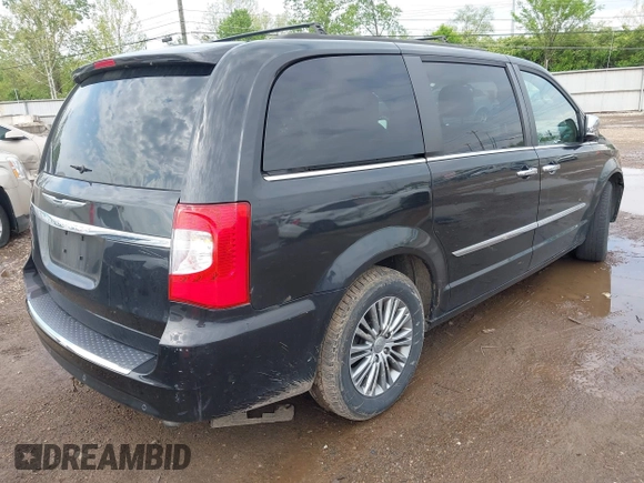 2014 Chrysler Town & Country Touring L with VIN 2C4RC1CG5ER378194, listed as a IAAI auction lot 42176454 with 178,448 mi miles and . Bid and sale history available at carsss.com. Image 4.