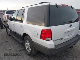 2004 Ford Expedition Special Service with VIN 1FMPU16L64LA70855, listed as a IAAI auction lot 41231282 with 221,560 mi miles. Bid and sale history available at carsss.com. Image 3.