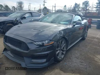 2019 Ford Mustang GT Premium z VIN 1FATP8FF2K5140520, wystawiony jako IAAI lot #41399442 z przebiegiem 101 737 mil mil oraz . Historia ofert i sprzedaży dostępna na DreamBid. Obrazek 17.