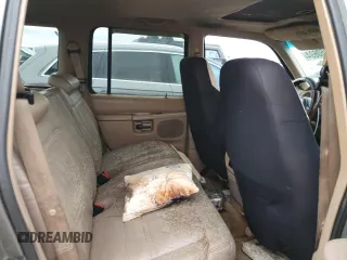 1999 Ford Explorer XL z VIN 1FMDU32E9XZB67958, wystawiony jako Copart lot #75350694 z przebiegiem 202 939 mil mil oraz Szkoda całkowita • Salvage title. Historia ofert i sprzedaży dostępna na DreamBid. Obrazek 11.