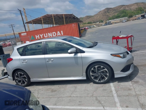 2018 Toyota Corolla iM with VIN JTNKARJE9JJ553578, listed as a IAAI auction lot 42078272 with 63,928 mi miles. Bid and sale history available at carsss.com. Image 14.