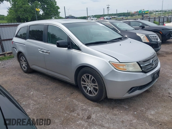 2012 Honda Odyssey EX-L with VIN 5FNRL5H66CB081323, listed as a IAAI auction lot 42465110 with 266,934 mi miles and . Bid and sale history available at DreamBid. Image 1.