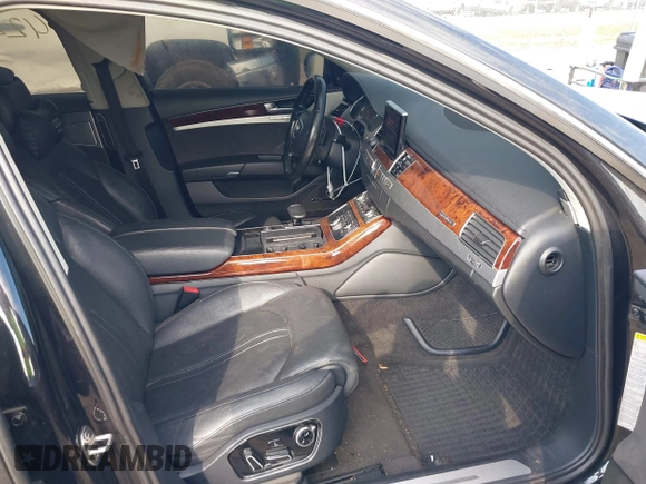 2012 Audi A8 with VIN WAUAVAFD8CN029546, listed as a IAAI auction lot 42216382 with 144,989 mi miles and . Bid and sale history available at DreamBid. Image 5.