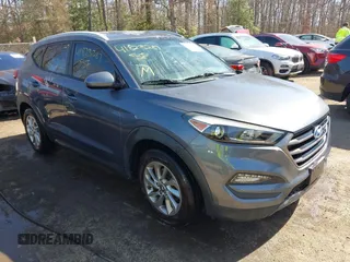 2016 Hyundai Tucson SE z VIN KM8J3CA47GU217090, wystawiony jako IAAI lot #41823287 z przebiegiem 42 902 mil mil oraz . Historia ofert i sprzedaży dostępna na DreamBid. Obrazek 1.