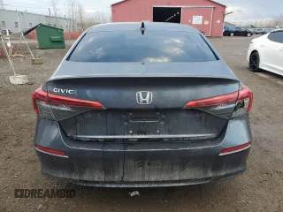 2022 Honda Civic LX z VIN 2HGFE2F21NH103335, wystawiony jako Copart lot #48901245 z przebiegiem 87 844 mil mil oraz Czysty tytuł • Clean title. Historia ofert i sprzedaży dostępna na DreamBid. Obrazek 6.