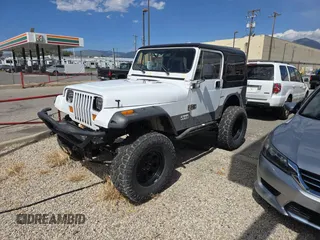 1993 Jeep Wrangler S z VIN 1J4FY19P5PP261872, wystawiony jako Copart lot #58435955 z przebiegiem 127 959 mil mil oraz Czysty tytuł • Clean title. Historia ofert i sprzedaży dostępna na DreamBid. Obrazek 2.