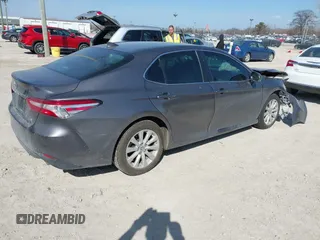 2019 Toyota Camry LE with VIN 4T1B11HK9KU810347, listed as a IAAI auction lot 41804007 with 75,063 mi miles and . Bid and sale history available at DreamBid. Image 4.