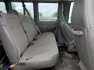 2016 Chevrolet Express Passenger LT z VIN 1GAZGPFF1G1176799, wystawiony jako Copart lot #57258115 z przebiegiem 199 406 mil mil oraz Szkoda całkowita • Salvage title. Historia ofert i sprzedaży dostępna na DreamBid. Obrazek 11.