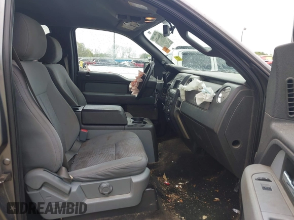 2014 Ford F-150 XL with VIN 1FTFW1CT3EFB24661, listed as a IAAI auction lot 42016408 with 186,888 mi miles and . Bid and sale history available at DreamBid. Image 5.