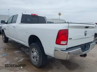 2016 Ram 2500 SLT with VIN 3C6TR5JT7GG140505, listed as a IAAI auction lot 41231006 with 80,409 mi miles and . Bid and sale history available at DreamBid. Image 3.