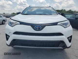 2018 Toyota RAV4 Hybrid SE with VIN JTMJJREVXJD212926, listed as a Copart auction lot 60215465 with 71,876 mi miles and Salvage title. Bid and sale history available at DreamBid. Image 5.