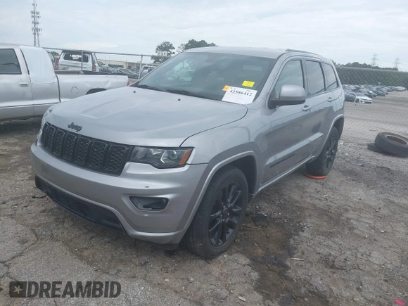 2018 Jeep Grand Cherokee Laredo E z VIN 1C4RJEAG5JC404022, wystawiony jako IAAI lot #42586412 z przebiegiem 95 798 mil mil oraz . Historia ofert i sprzedaży dostępna na DreamBid. Obrazek 17.