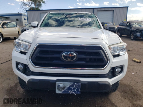 2021 Toyota Tacoma SR with VIN 3TYAX5GN5MT015924, listed as a Copart auction lot 59523615 with 79,693 mi miles and Salvage title. Bid and sale history available at DreamBid. Image 5.