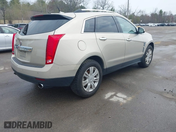 2011 Cadillac SRX Luxury Collection with VIN 3GYFNAEY4BS663447, listed as a IAAI auction lot 42134933 with 153,411 mi miles and . Bid and sale history available at DreamBid. Image 4.