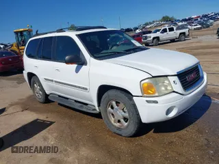 2002 GMC Envoy SLT with VIN 1GKDS13S622507379, listed as a IAAI auction lot 41641163 with 201,089 mi miles. Bid and sale history available at carsss.com. Image 1.