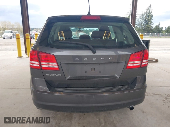 2015 Dodge Journey SE z VIN 3C4PDCAB1FT617794, wystawiony jako IAAI lot #41922371 z przebiegiem 130 558 mil mil oraz . Historia ofert i sprzedaży dostępna na DreamBid. Obrazek 17.