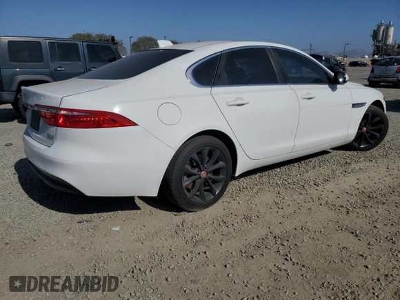 2017 Jaguar XF with VIN SAJBJ4BNXHCY32012, listed as a Copart auction lot 53871255 with 112,204 mi miles and Salvage Title. Bid and sale history available at DreamBid. Image 3.
