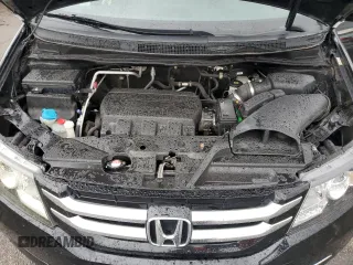 2015 Honda Odyssey EX-L z VIN 5FNRL5H64FB048406, wystawiony jako Copart lot #58044065 z przebiegiem 61 005 mil mil oraz Szkoda całkowita • Salvage title. Historia ofert i sprzedaży dostępna na DreamBid. Obrazek 12.