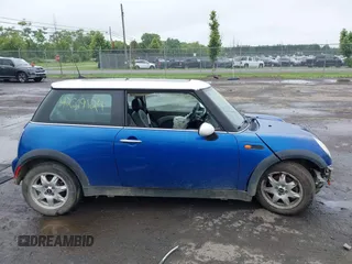 2006 MINI Hardtop with VIN WMWRC33516TK18735, listed as a IAAI auction lot 42519124 with 135,976 mi miles and . Bid and sale history available at DreamBid. Image 14.