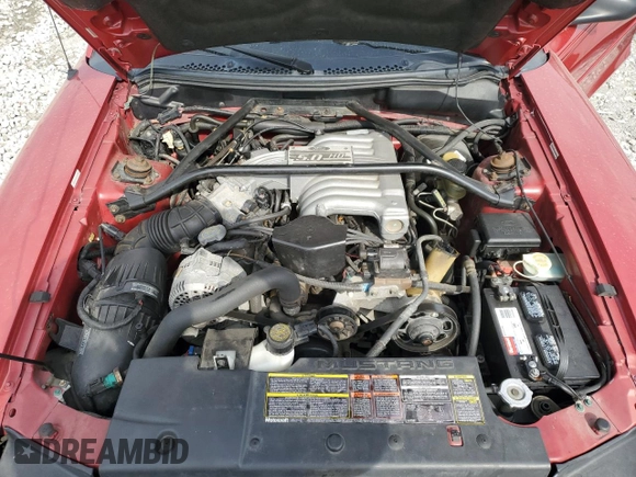 1994 Ford Mustang z VIN 1FALP45T9RF162535, wystawiony jako Copart lot #53549795 z przebiegiem 86 430 mil mil oraz Szkoda całkowita • Salvage title. Historia ofert i sprzedaży dostępna na DreamBid. Obrazek 11.