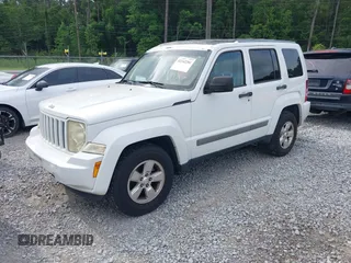 2012 Jeep Liberty Sport Latitude z VIN 1C4PJLAKXCW145609, wystawiony jako IAAI lot #42342281 z przebiegiem 107 256 mil mil oraz . Historia ofert i sprzedaży dostępna na DreamBid. Obrazek 2.