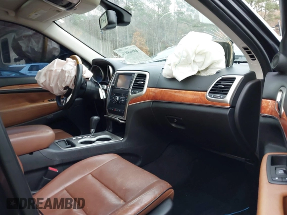 2012 Jeep Grand Cherokee Overland with VIN 1C4RJECT7CC334116, listed as a IAAI auction lot 40968071 with 98,794 mi miles. Bid and sale history available at carsss.com. Image 5.