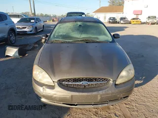 2003 Ford Taurus LX Standard with VIN 1FAFP52U33A235063, listed as a IAAI auction lot 41777293 with 164,125 mi miles and . Bid and sale history available at DreamBid. Image 12.