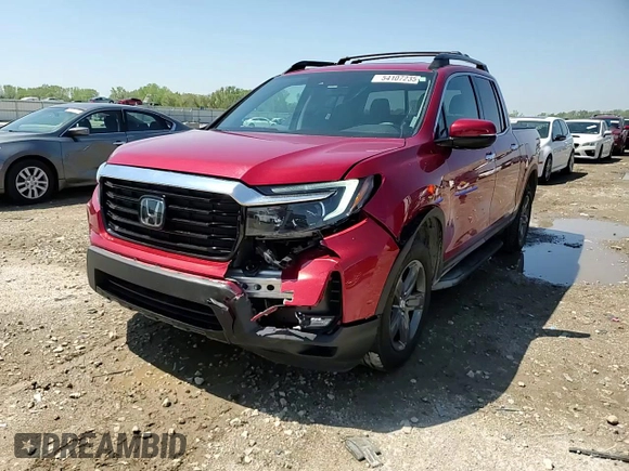 2023 Honda Ridgeline RTL-E with VIN 5FPYK3F76PB016502, listed as a Copart auction lot 54107235 with 27,516 mi miles and Salvage title. Bid and sale history available at DreamBid. Image 13.