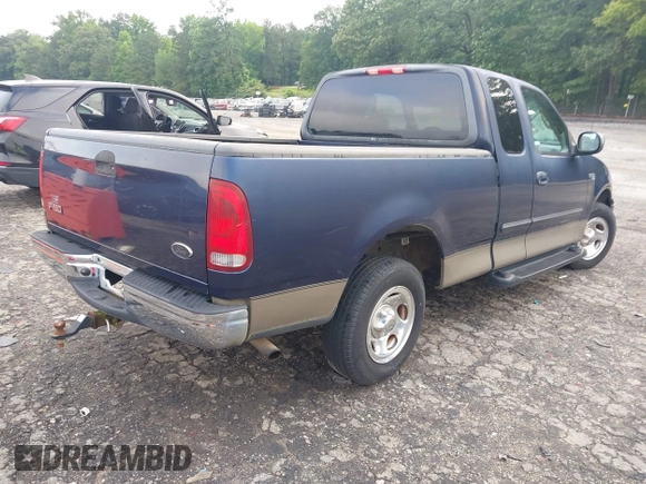 2002 Ford F-150 XL with VIN 1FTRX17202NA66022, listed as a IAAI auction lot 42382320 with 87,916 mi miles and . Bid and sale history available at DreamBid. Image 4.