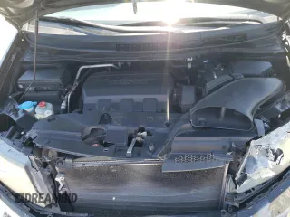 2014 Honda Odyssey Touring with VIN 5FNRL5H97EB016624, listed as a Copart auction lot 53444645 with 244,126 mi miles and Salvage Title. Bid and sale history available at DreamBid. Image 13.