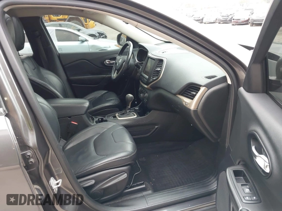 2014 Jeep Cherokee Limited z VIN 1C4PJMDB2EW182111, wystawiony jako IAAI lot #42179182 z przebiegiem 156 257 mil mil oraz . Historia ofert i sprzedaży dostępna na DreamBid. Obrazek 5.
