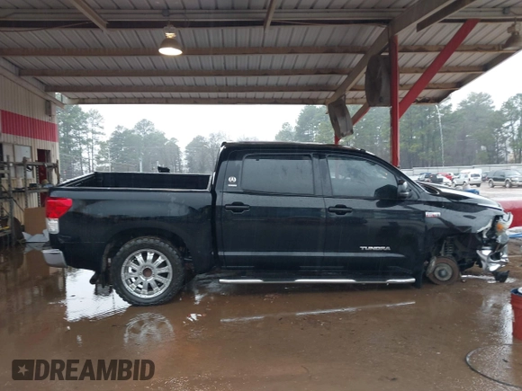 2012 Toyota Tundra 4WD Truck with VIN 5TFDW5F1XCX253223, listed as a IAAI auction lot 41453842 with 163,730 mi miles. Bid and sale history available at carsss.com. Image 14.