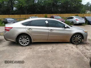 2013 Toyota Avalon XLE z VIN 4T1BK1EB6DU065481, wystawiony jako IAAI lot #42299194 z przebiegiem 220 763 mil mil oraz . Historia ofert i sprzedaży dostępna na DreamBid. Obrazek 13.
