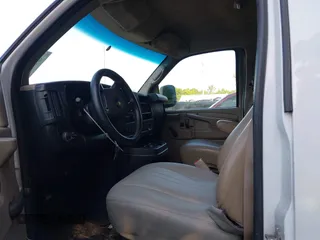 2013 Chevrolet Express Cargo with VIN 1GCWGFCA4D1193430, listed as a IAAI auction lot 42557051 with 245,205 mi miles and . Bid and sale history available at DreamBid. Image 5.