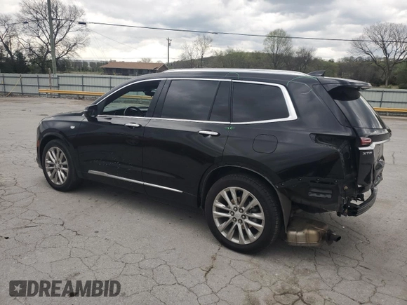 2021 Cadillac XT6 Premium Luxury z VIN 1GYKPCRS1MZ169952, wystawiony jako Copart lot #51908895 z przebiegiem 31 834 mil mil oraz Szkody całkowita. Historia ofert i sprzedaży dostępna na DreamBid. Obrazek 2.