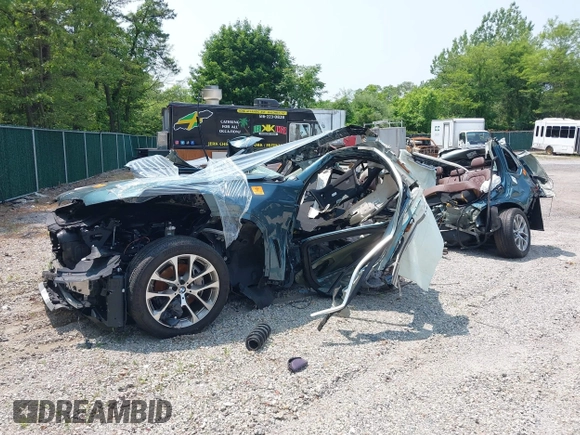 2024 BMW X5 xDrive40i with VIN 5UX23EU03R9V51425, listed as a IAAI auction lot 42273516 with 19,406 mi miles and . Bid and sale history available at DreamBid. Image 2.