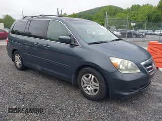 2006 Honda Odyssey EX-L z VIN 5FNRL38786B419399, wystawiony jako IAAI lot #42358154 z przebiegiem 188 722 mil mil oraz . Historia ofert i sprzedaży dostępna na DreamBid. Obrazek 1.
