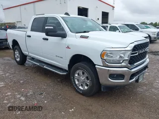 2024 Ram 2500 Big Horn with VIN 3C6UR5DL1RG233118, listed as a IAAI auction lot 42635680 with 46,755 mi miles and . Bid and sale history available at DreamBid. Image 1.