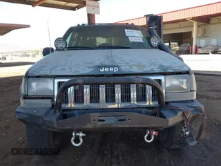 1994 Jeep Grand Cherokee Laredo with VIN 1J4GZ58S4RC280650, listed as a IAAI auction lot 42041261 with 199,265 mi miles and . Bid and sale history available at DreamBid. Image 6.