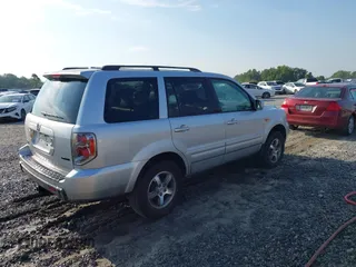 2008 Honda Pilot EX-L with VIN 5FNYF28528B027047, listed as a IAAI auction lot 42692510 with 251,260 mi miles and . Bid and sale history available at DreamBid. Image 4.
