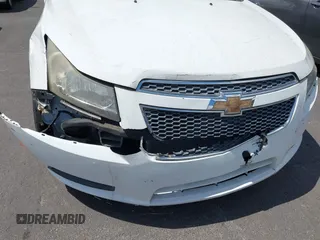 2014 Chevrolet Cruze 1LT with VIN 1G1PC5SB4E7132171, listed as a IAAI auction lot 42532531 with 132,012 mi miles and . Bid and sale history available at DreamBid. Image 13.