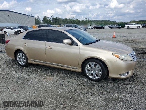 2011 Toyota Avalon with VIN 4T1BK3DB0BU408974, listed as a Copart auction lot 60434835 with 131,417 mi miles and Salvage title. Bid and sale history available at DreamBid. Image 4.
