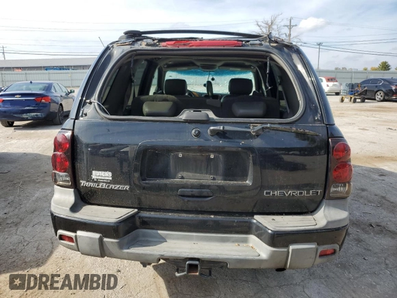 2003 Chevrolet TrailBlazer LTZ with VIN 1GNDT13S332196883, listed as a Copart auction lot 77031124 with 167,328 mi miles and Salvage Title. Bid and sale history available at DreamBid. Image 6.