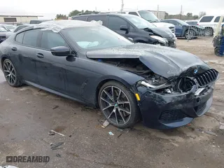 2021 BMW 8 Series M850i with VIN WBAGV8C03MCG68700, listed as a IAAI auction lot 41684696 with 18,516 mi miles. Bid and sale history available at carsss.com. Image 1.
