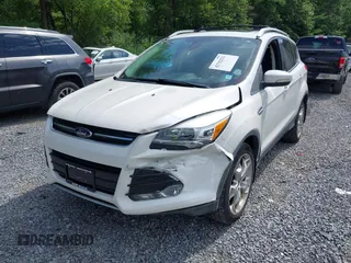 2013 Ford Escape Titanium z VIN 1FMCU9J9XDUA10838, wystawiony jako IAAI lot #42702521 z przebiegiem 86 815 mil mil oraz . Historia ofert i sprzedaży dostępna na DreamBid. Obrazek 6.