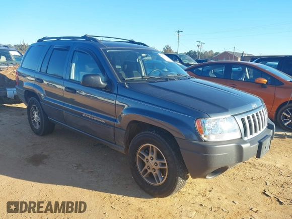 2004 Jeep Grand Cherokee Laredo z VIN 1J4GW48S24C159370, wystawiony jako IAAI lot #41296094 z przebiegiem 138 296 mil mil oraz . Historia ofert i sprzedaży dostępna na DreamBid. Obrazek 1.